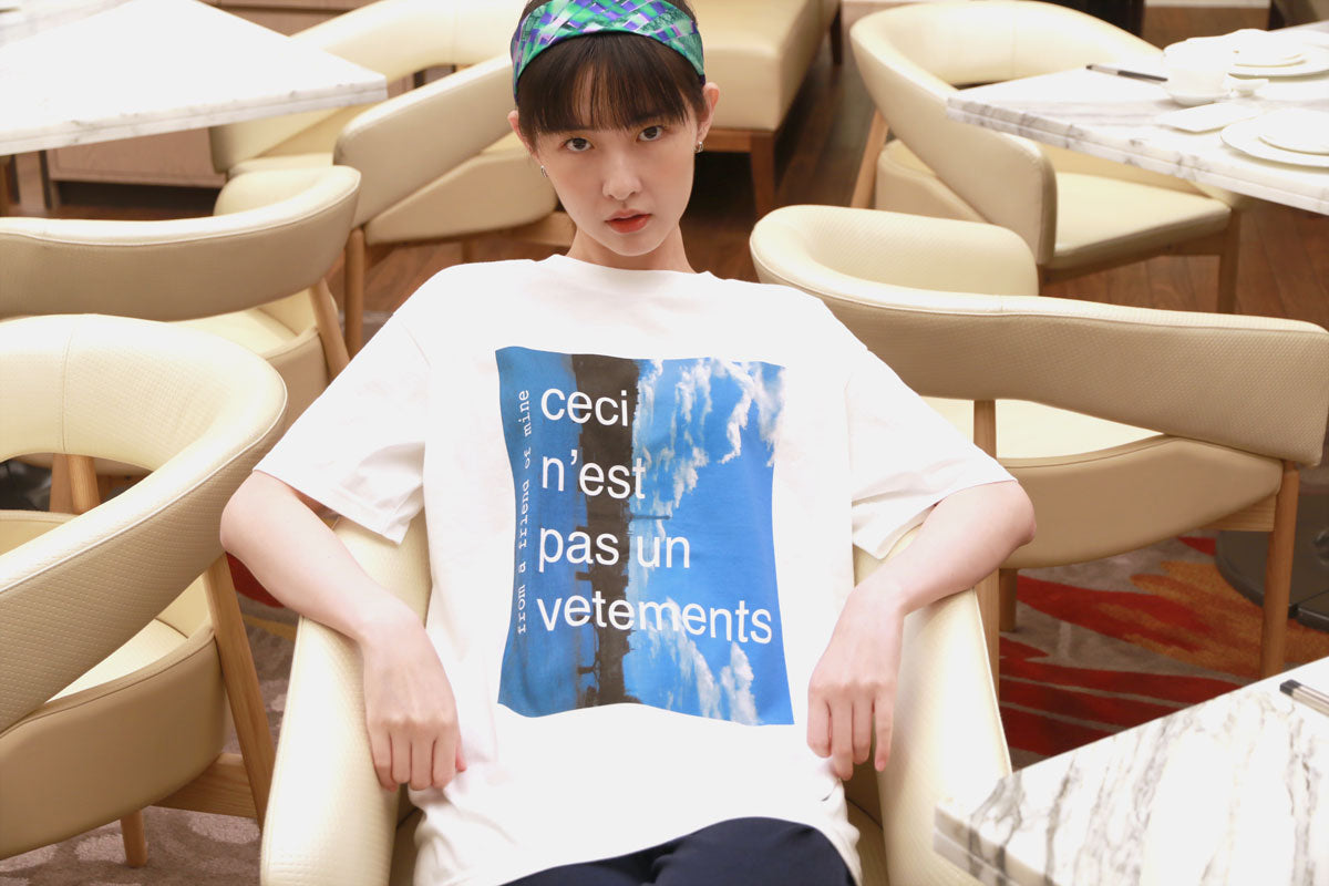 Printed white T-shirt "Ceci n'est pas un vetements" from a friend of mine online paris taipei tokyo