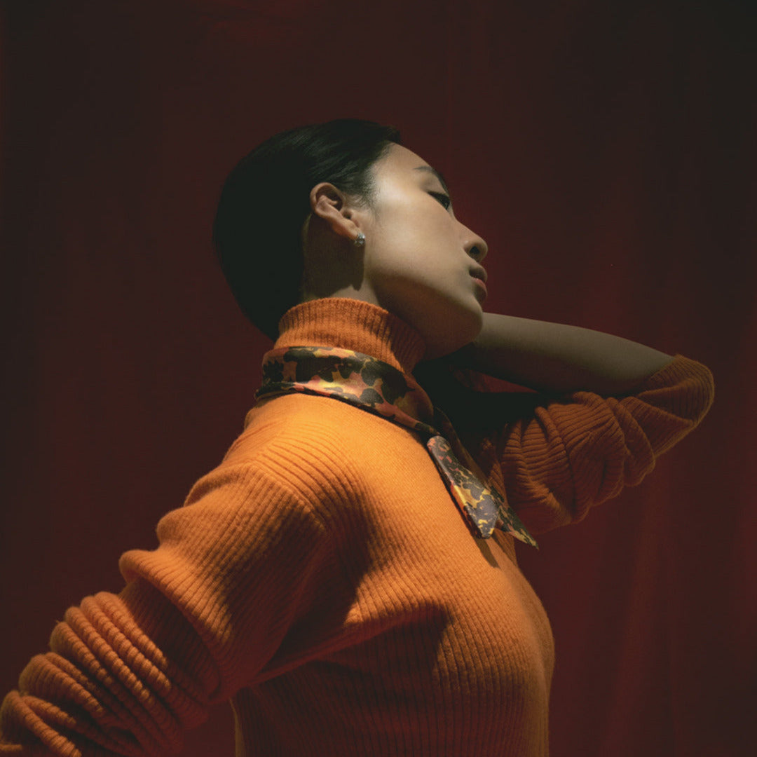 Woman in silk scarf Calvin Lauren from a friend of mine, scarf made in japan. French chic scarf styles.