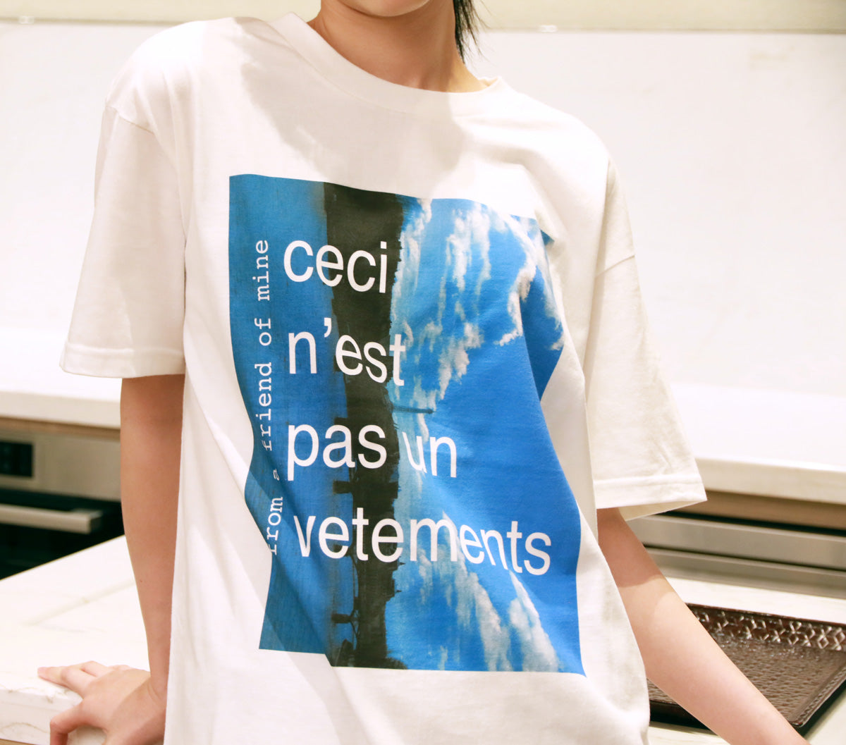 Buy Printed white T-shirt "Ceci n'est pas un vetements" from a friend of mine online paris taipei tokyo
