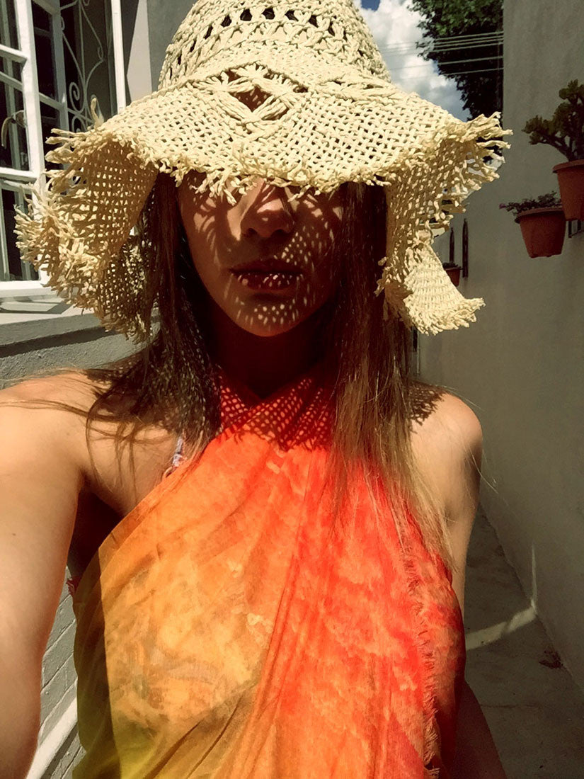 Buy stylish orange sarong, beachwear and wraps for women; perfect luxury accessories for summer.